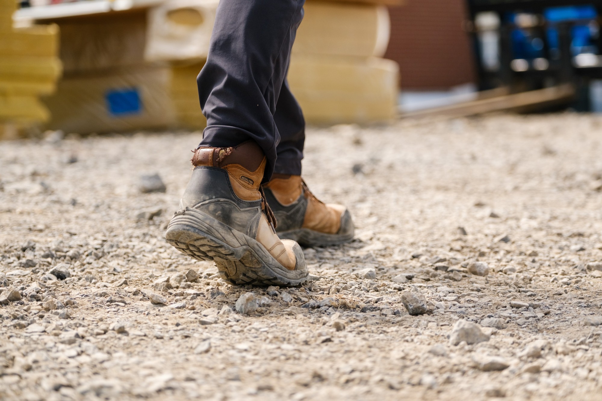 Image of Chandos Construction employee in Calgary looking at her work