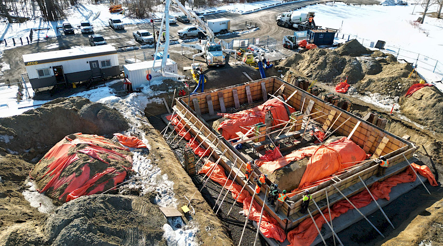 Drone image of the Petrie Island Canoe Club during construction built by Chandos Construction Ottawa with the below grade concrete structure