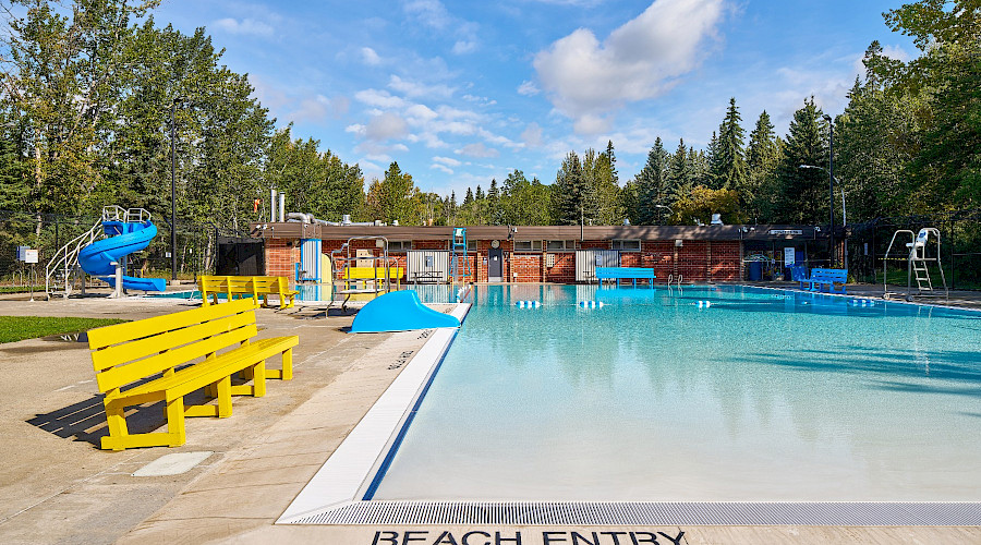 Exterior shot of the entrance of the Mill Creek Pool, renovated by Chandos Construction Edmonton