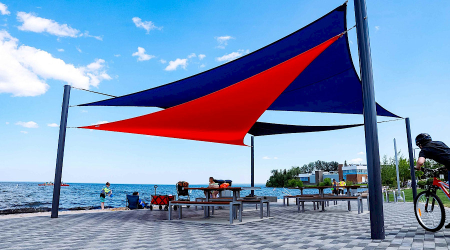 Image of shade sail structure at Kinosoo Beach in Cold Lake, Alberta, built by Chandos Construction Civil team